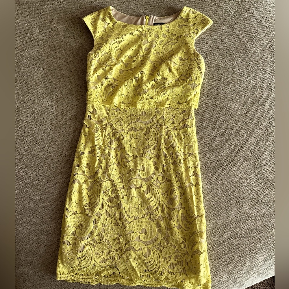 Bright yellow lace cap sleeve dress. Size 6 great condition. Knee length.